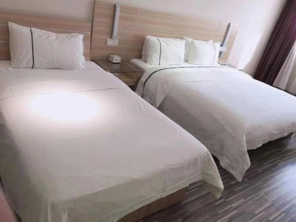 Bed in City Comfort Inn Chibi Railway Station