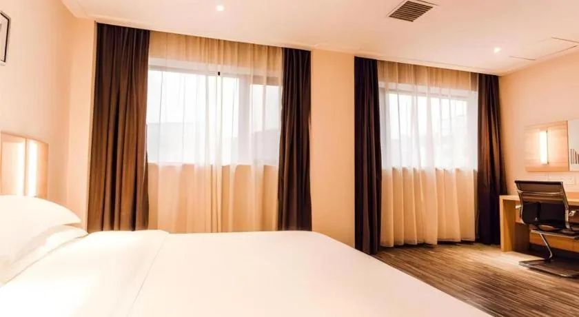 Bed in City Comfort Inn Chibi Railway Station