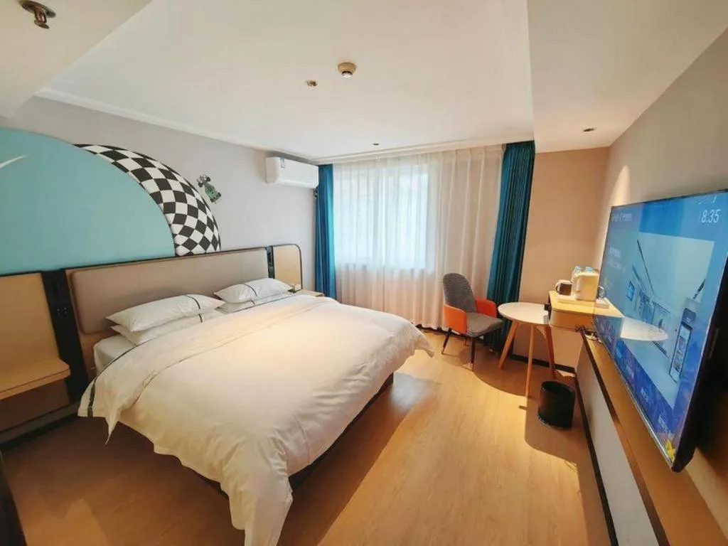 Bed in City Comfort Inn Chibi Railway Station