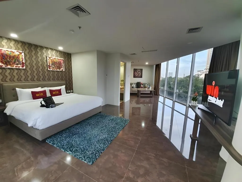 Bed in Win Premier Hotel Mangga Besar