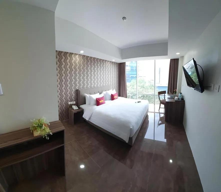 Bed in Win Premier Hotel Mangga Besar