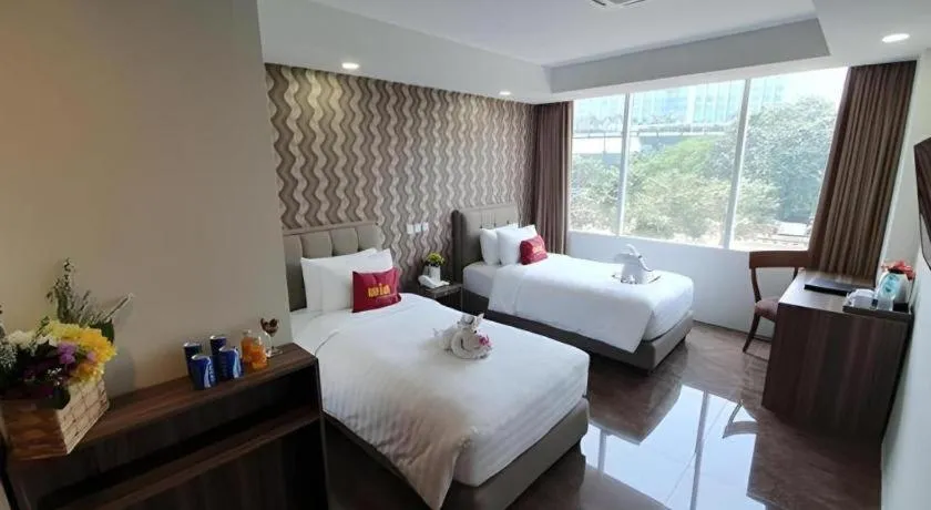 Bed in Win Premier Hotel Mangga Besar
