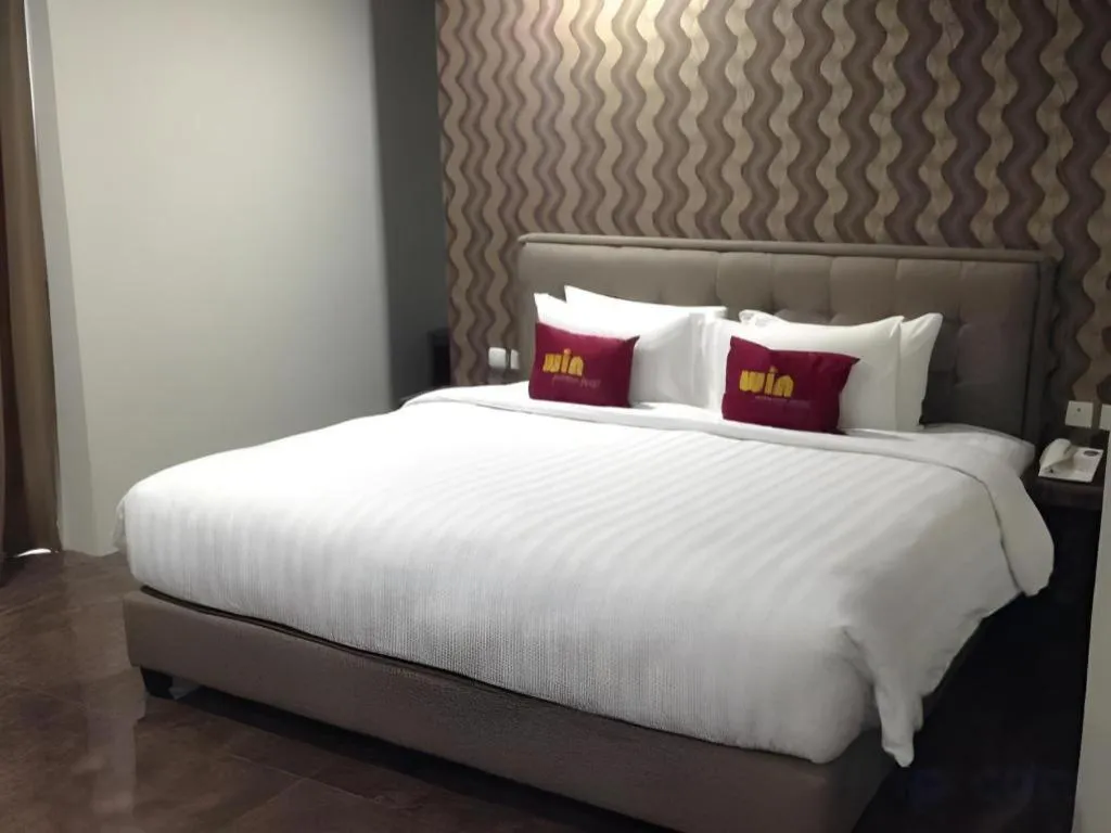 Bed in Win Premier Hotel Mangga Besar
