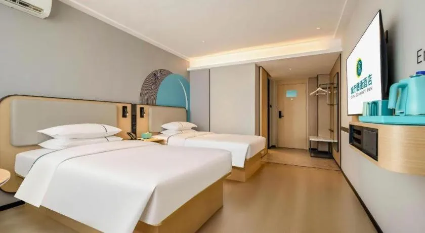 Bed in City Comfort Inn Nanning Guangxi University