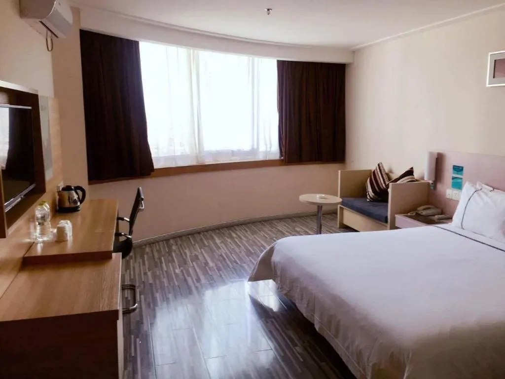 Bed in City Comfort Inn Nanning Guangxi University