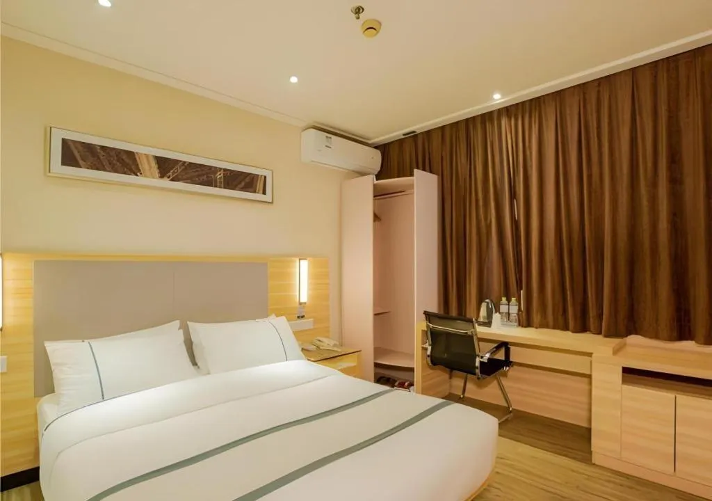 Bed in City Comfort Inn Nanning Guangxi University