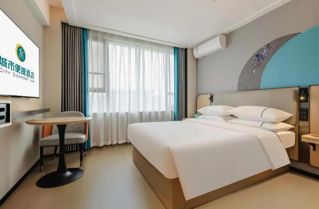 Bed in City Comfort Inn Nanning Guangxi University