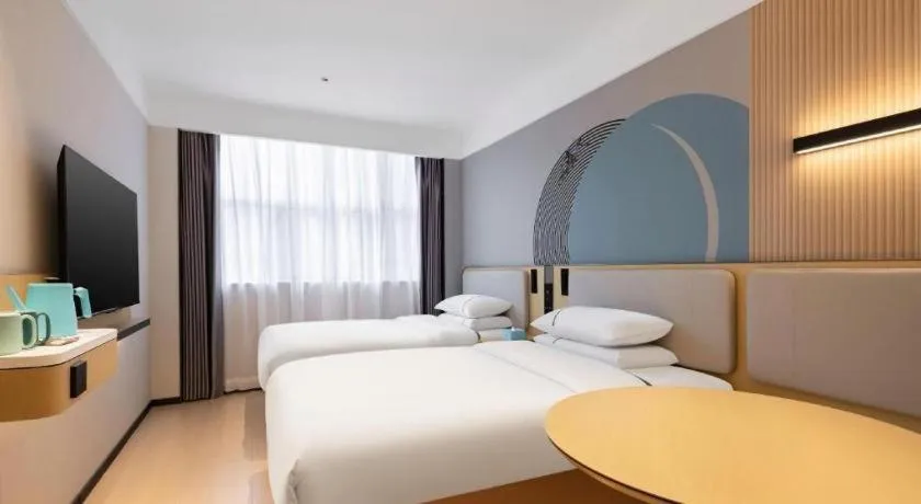 Bed in City Comfort Inn Nanning Guangxi University