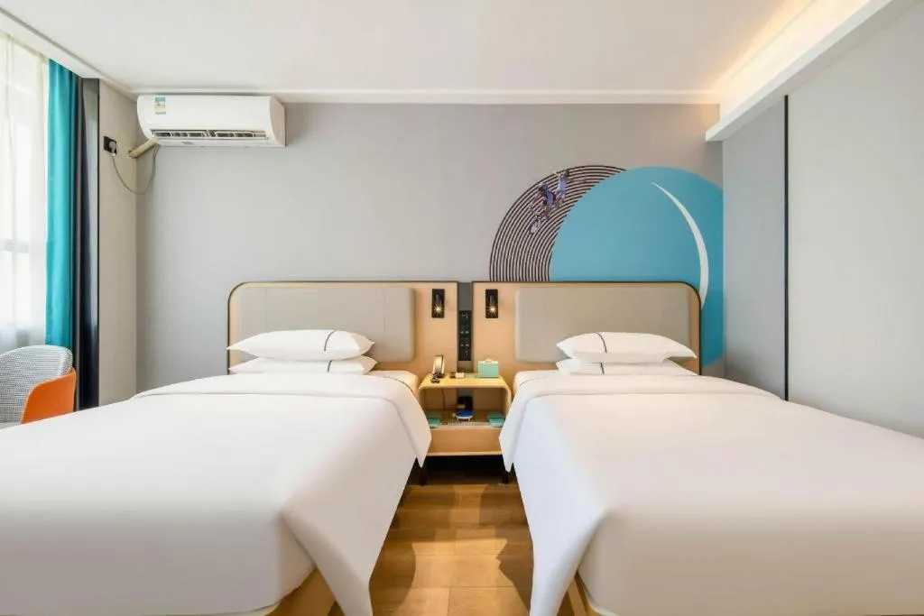 Bed in City Comfort Inn Nanning Guangxi University