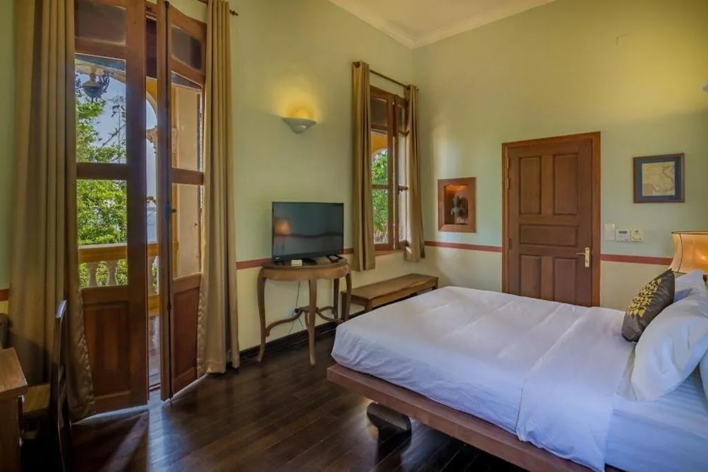 Bed in Le Relais de Chhlong