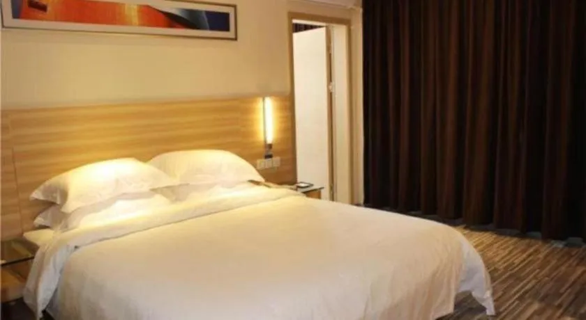 Bed in City Comfort Inn Zhongshan Shaxi Starbao Rosewood Expo City