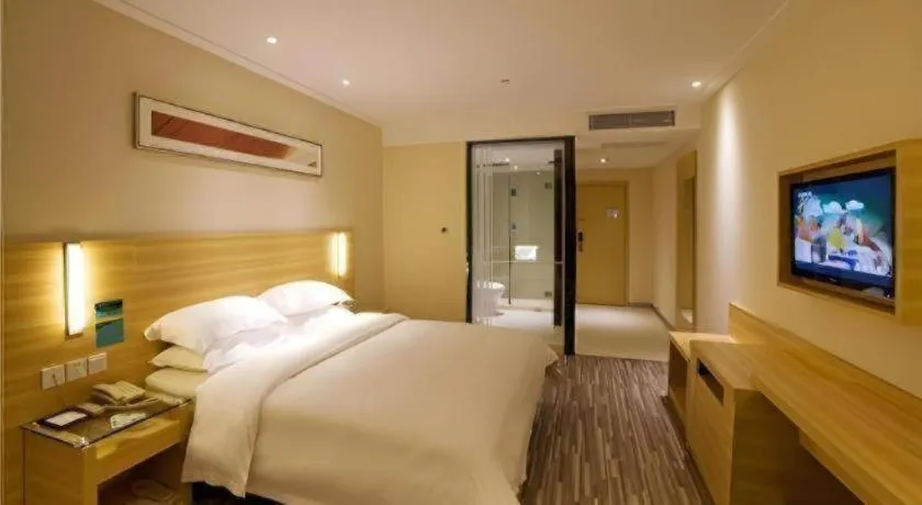 Bed in City Comfort Inn Zhongshan Shaxi Starbao Rosewood Expo City
