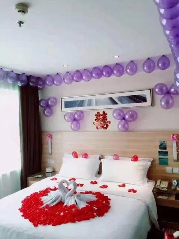 Bed in City Comfort Inn Zhongshan Shaxi Starbao Rosewood Expo City