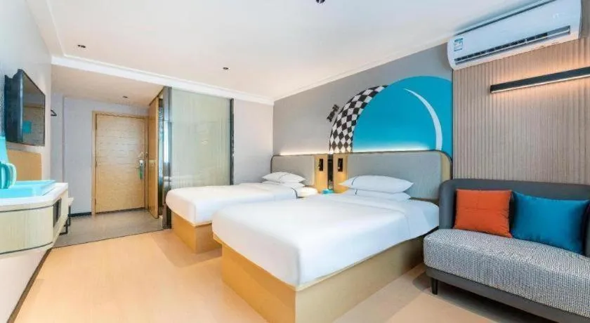 Bed in City Comfort Inn Zhongshan Shaxi Starbao Rosewood Expo City