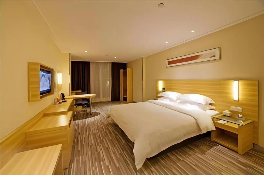 Bed in City Comfort Inn Zhongshan Shaxi Starbao Rosewood Expo City
