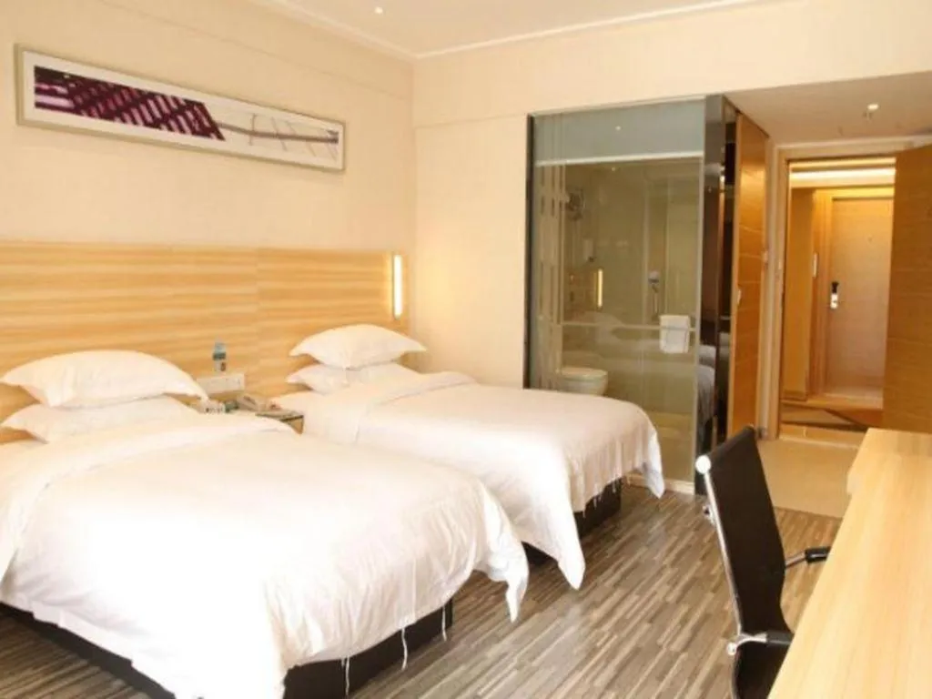 Bed in City Comfort Inn Zhongshan Shaxi Starbao Rosewood Expo City