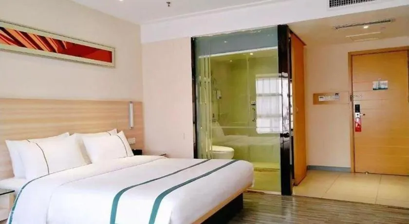 Bed in City Comfort Inn Zhongshan Shaxi Starbao Rosewood Expo City