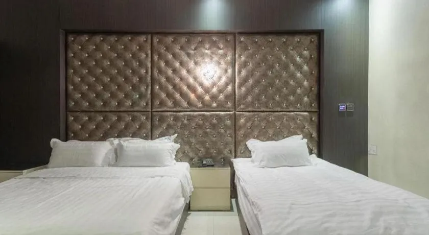 Bed in Qingdao Hengbo Hotel