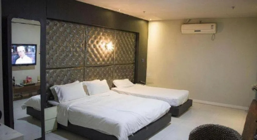 Bed in Qingdao Hengbo Hotel