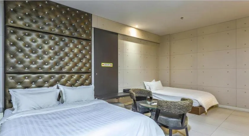 Bed in Qingdao Hengbo Hotel