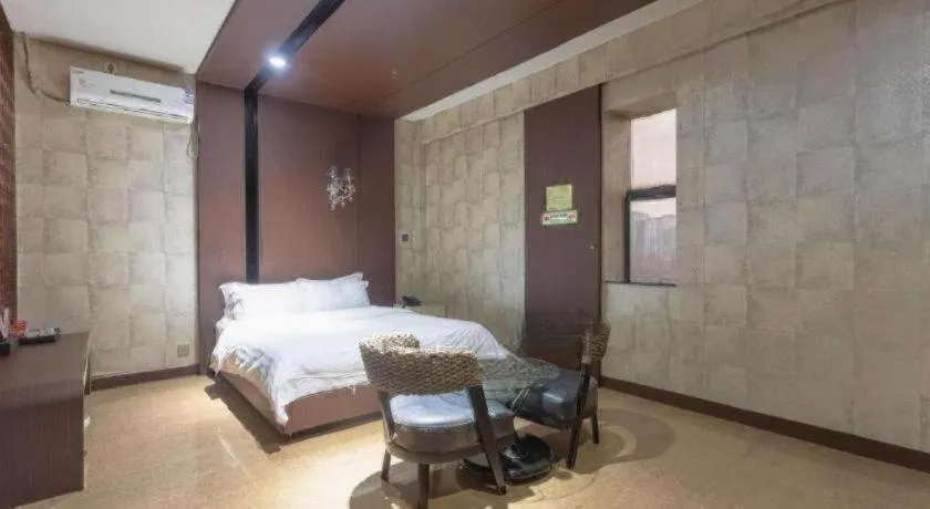 Bed in Qingdao Hengbo Hotel