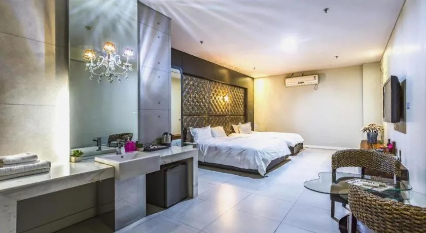 Bed in Qingdao Hengbo Hotel