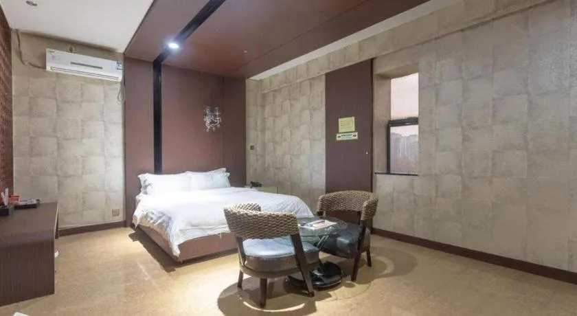 Bed in Qingdao Hengbo Hotel