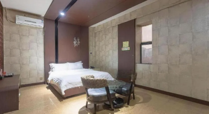 Bed in Qingdao Hengbo Hotel