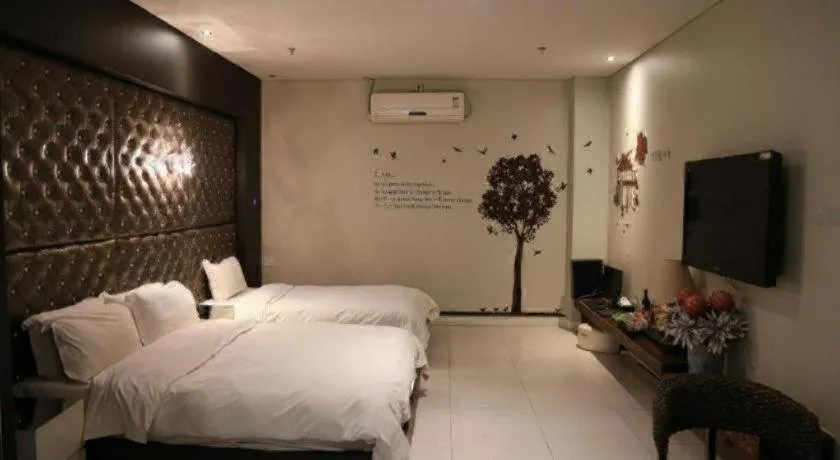 Bed in Qingdao Hengbo Hotel