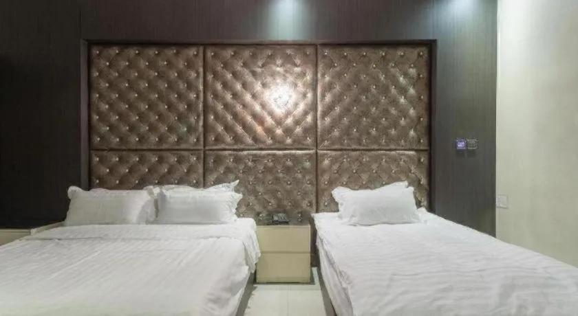 Bed in Qingdao Hengbo Hotel