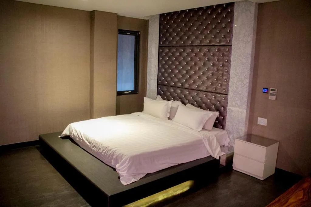 Bed in Qingdao Hengbo Hotel