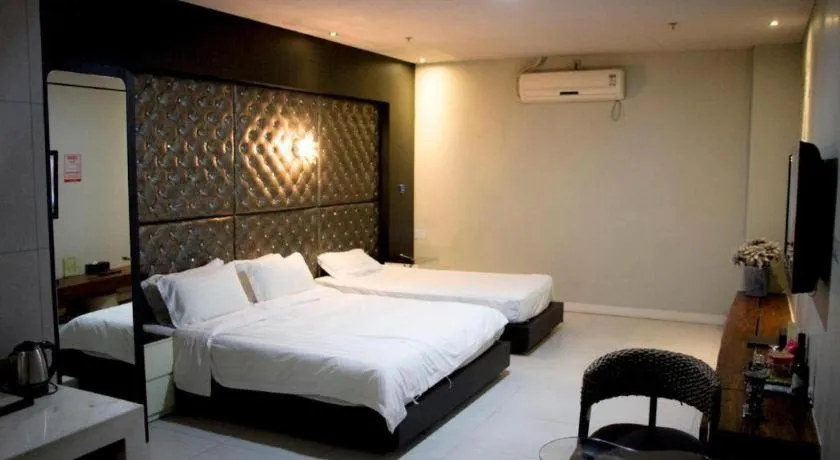 Bed in Qingdao Hengbo Hotel