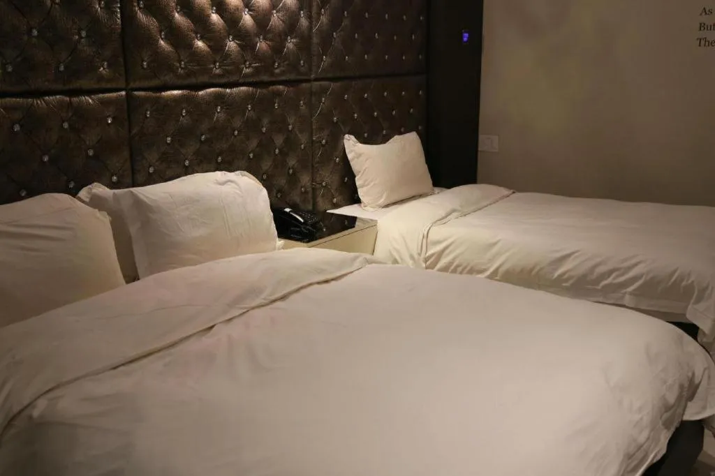 Bed in Qingdao Hengbo Hotel