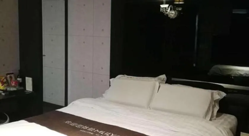 Bed in Qingdao Hengbo Hotel