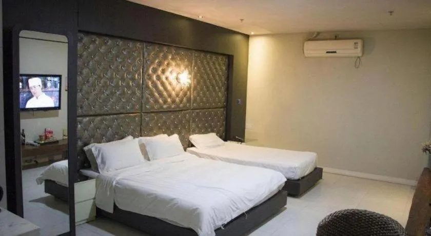 Bed in Qingdao Hengbo Hotel