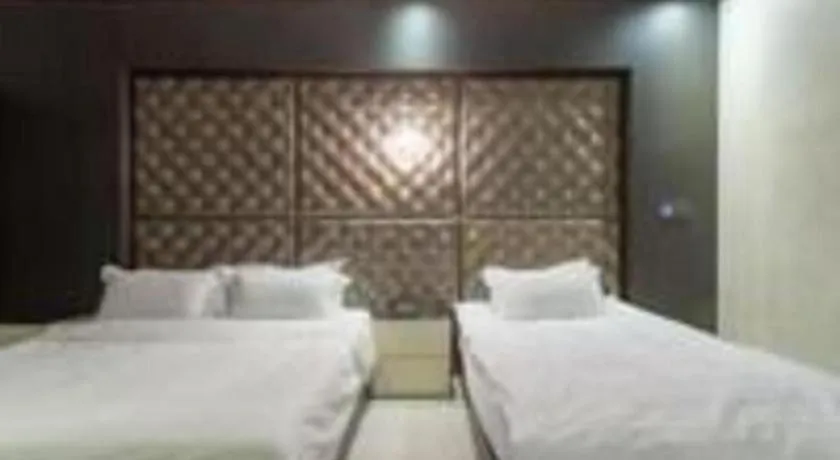 Bed in Qingdao Hengbo Hotel