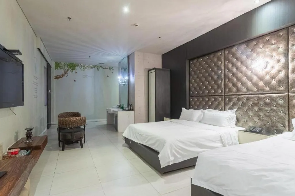 Bed in Qingdao Hengbo Hotel