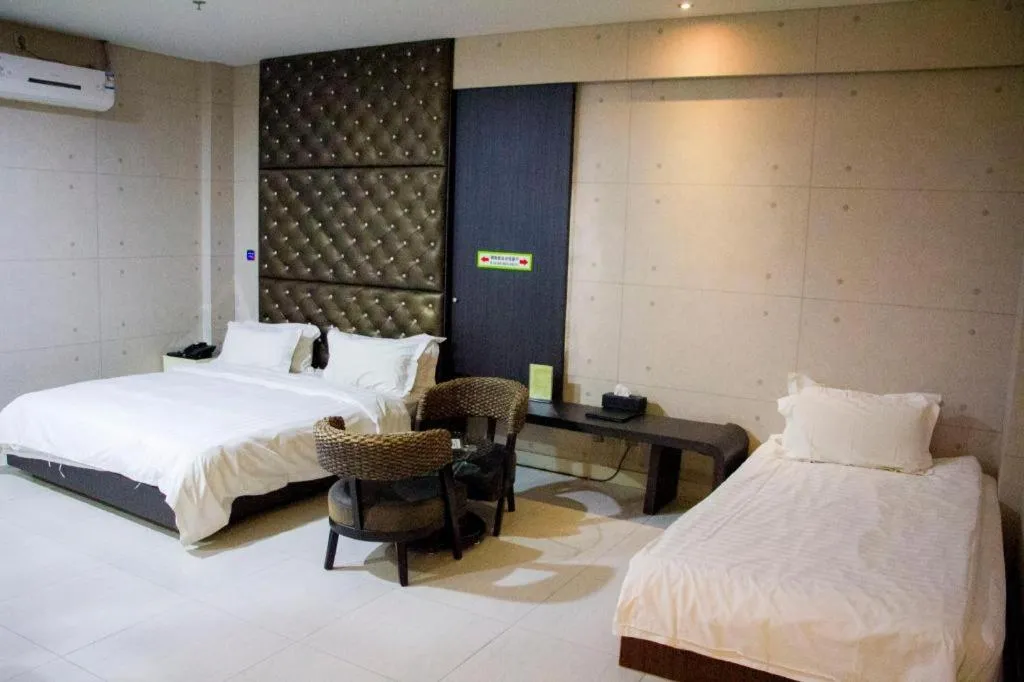 Bed in Qingdao Hengbo Hotel