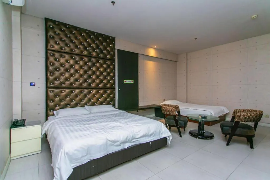 Bed in Qingdao Hengbo Hotel