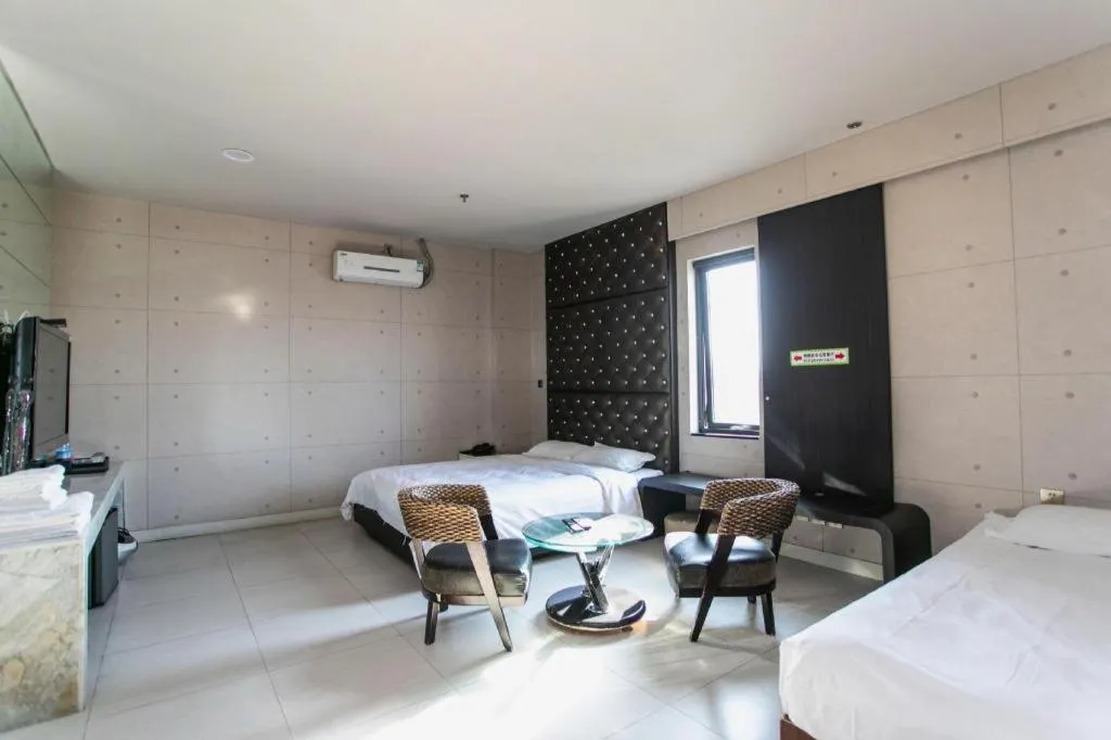 Bed in Qingdao Hengbo Hotel