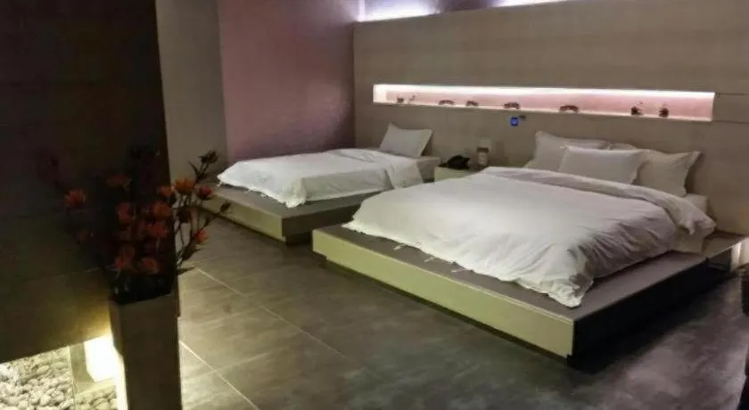 Bed in Qingdao Hengbo Hotel