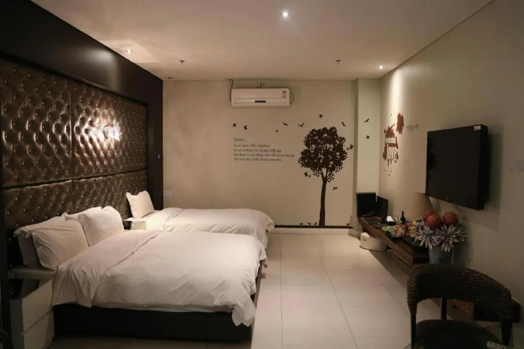 Bed in Qingdao Hengbo Hotel