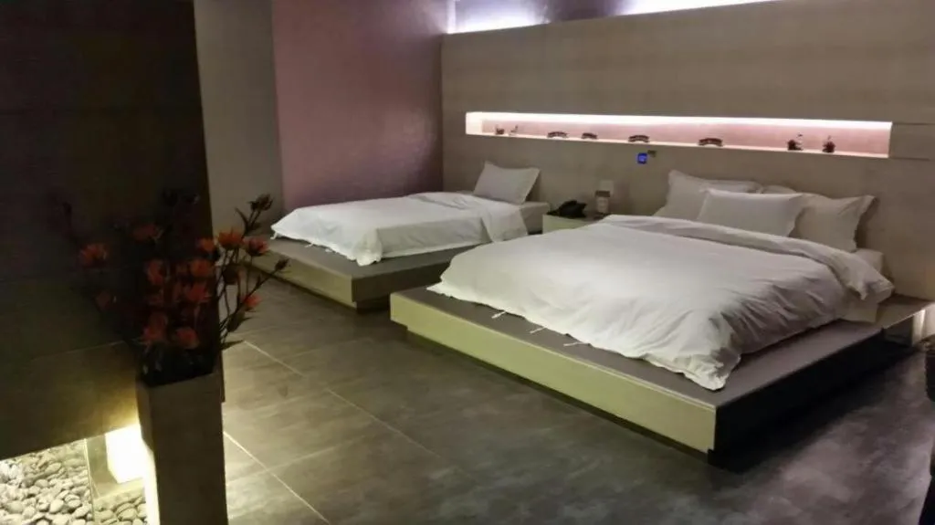 Bed in Qingdao Hengbo Hotel