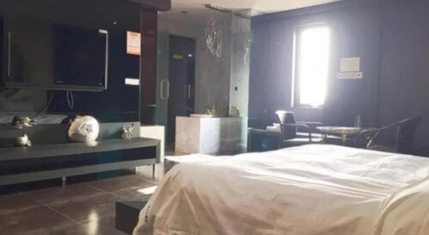 Bed in Qingdao Hengbo Hotel