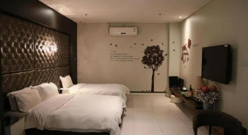 Bed in Qingdao Hengbo Hotel