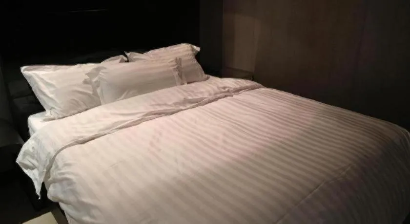 Bed in Qingdao Hengbo Hotel