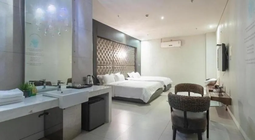 Bed in Qingdao Hengbo Hotel