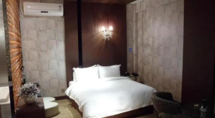 Bed in Qingdao Hengbo Hotel