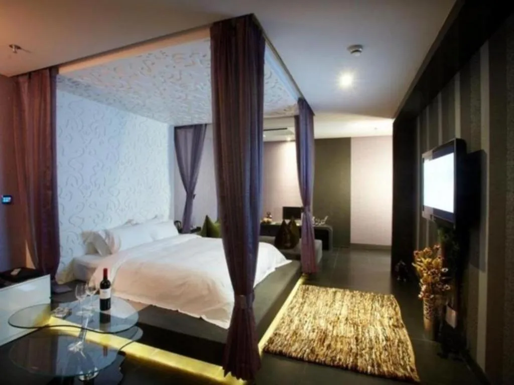 Bed in Qingdao Hengbo Hotel