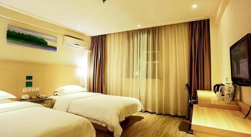 Bed in City Comfort Inn Wuzhou Wangcheng Square